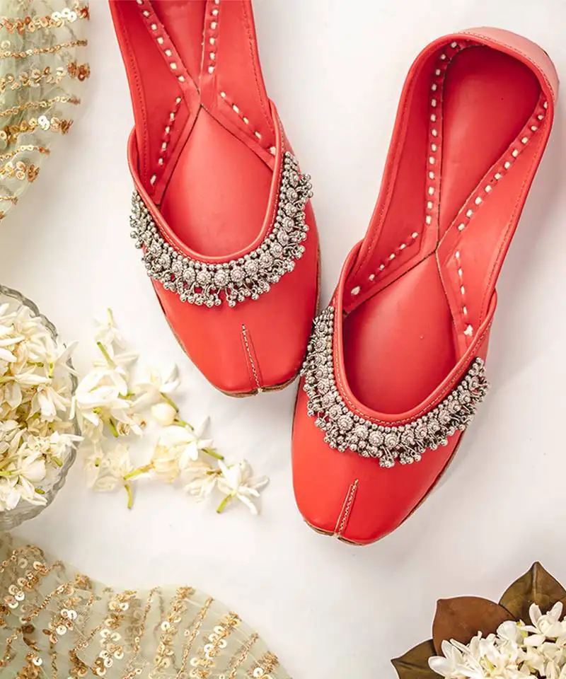 Red solid leather juttis