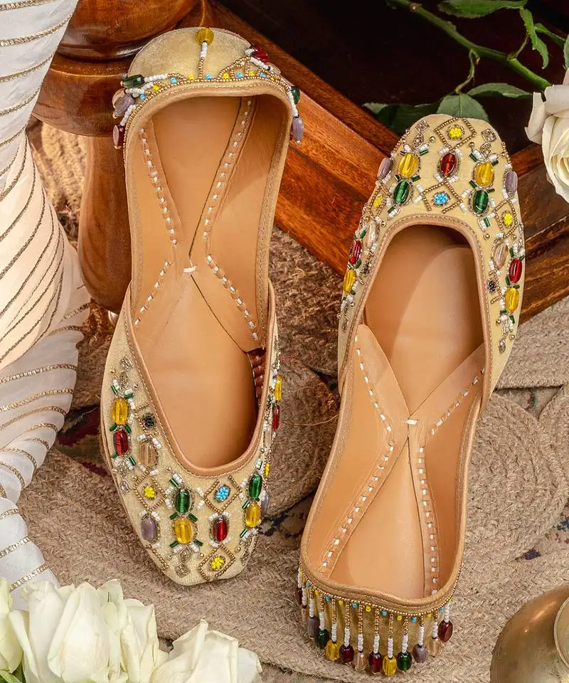 Gold beads embroidered leather juttis