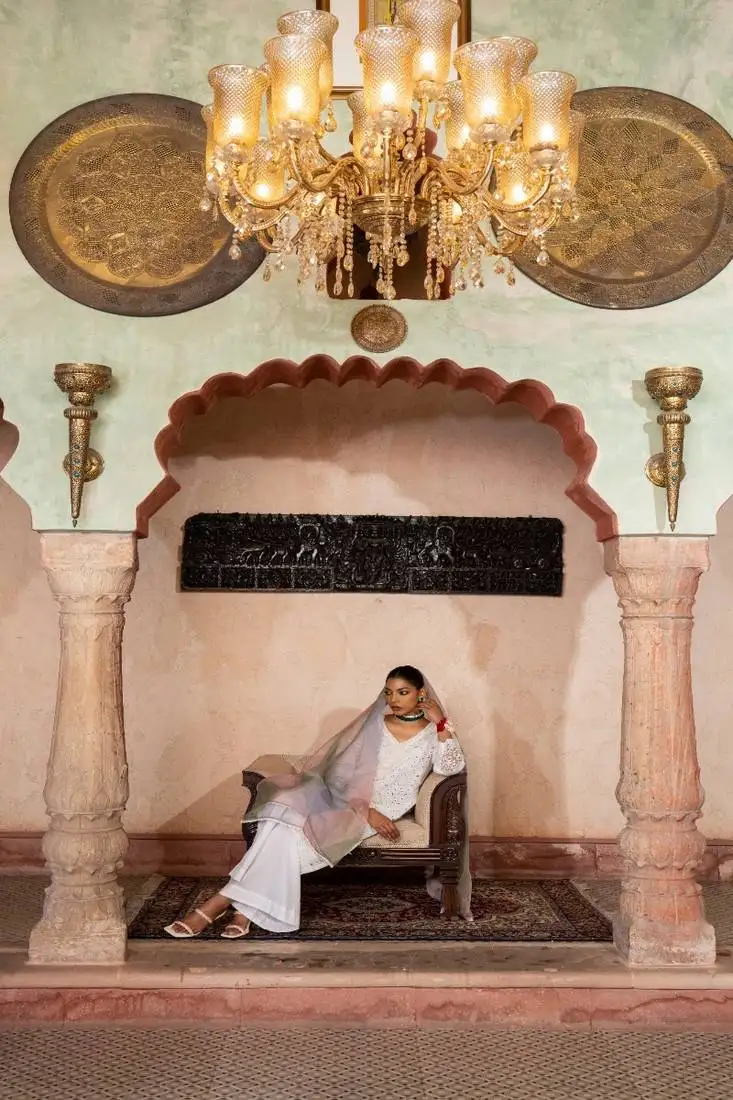 The luxury of our white chikan kari suit stitched