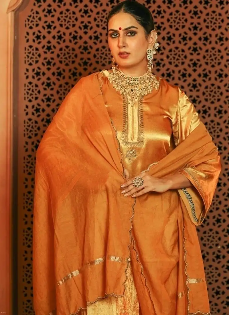 Gorgeous mustered yellow gajji silk embroidered sharara set stitched