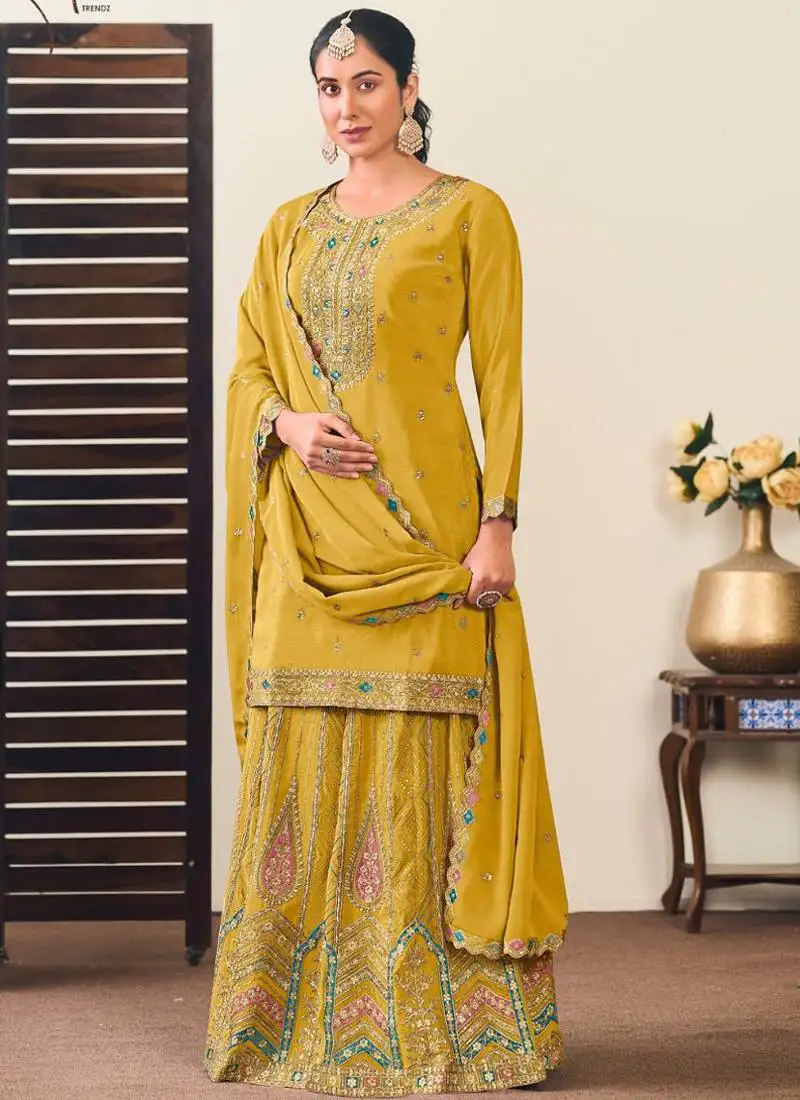 Yellow chinon silk embroidered lehenga style suit stitched