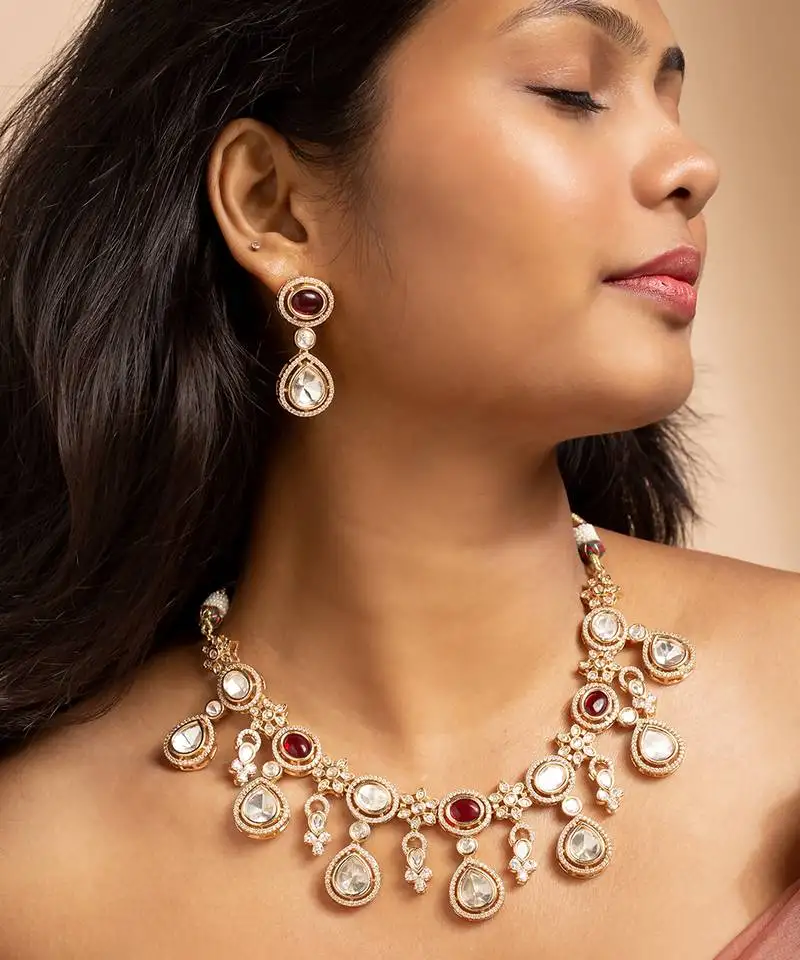 American diamond necklace set with red stone accents