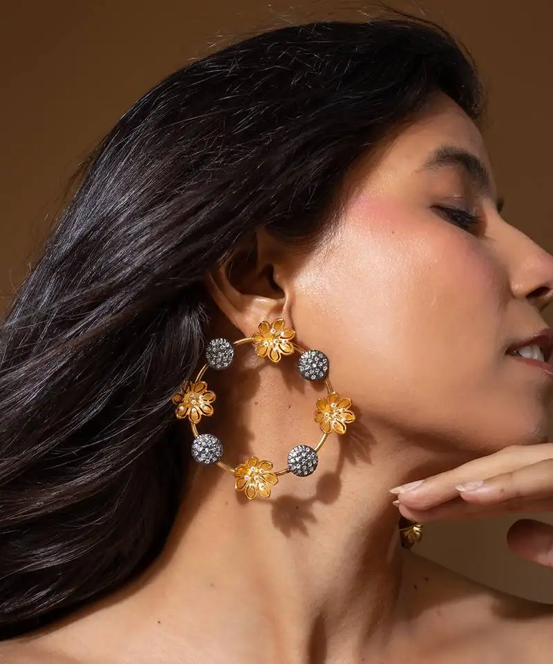 Two-tone floral earrings with crystal accents