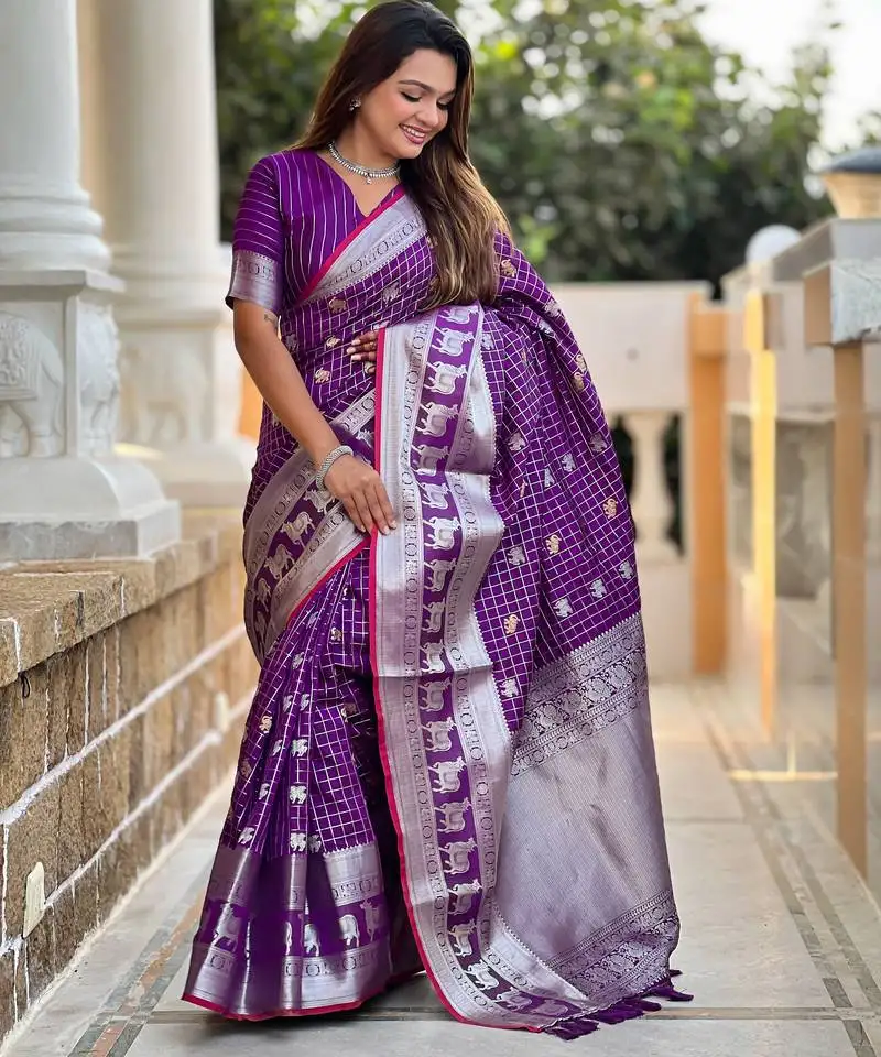 Purple self design embellished silk blend saree with blouse