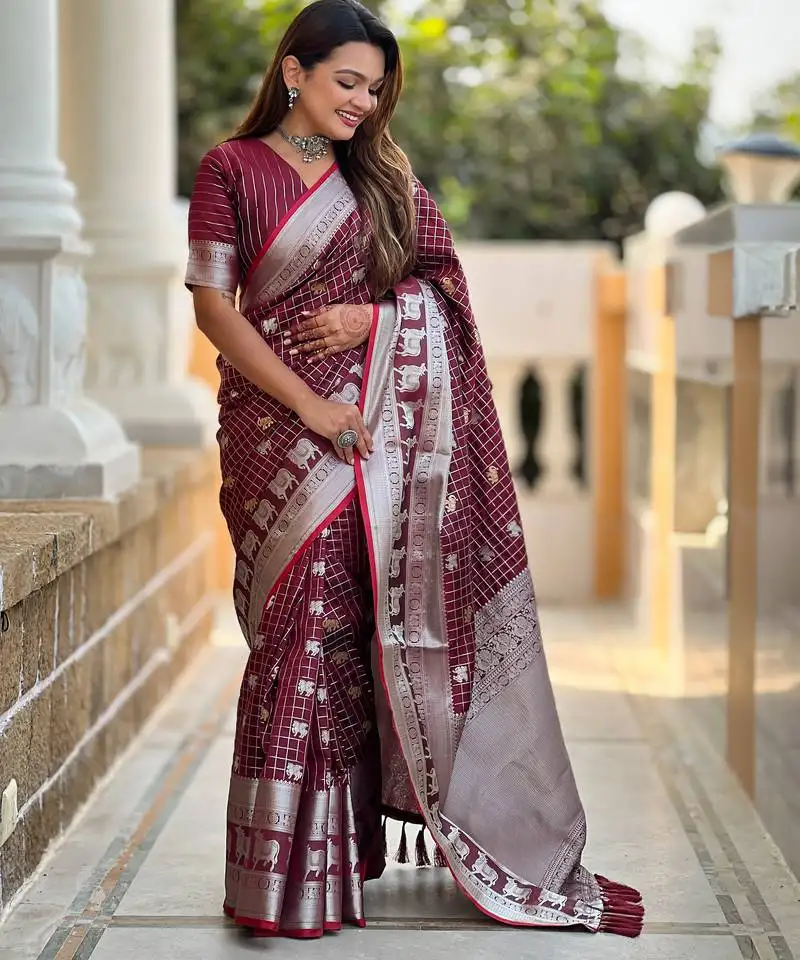 Maroon self design embellished silk blend saree with blouse