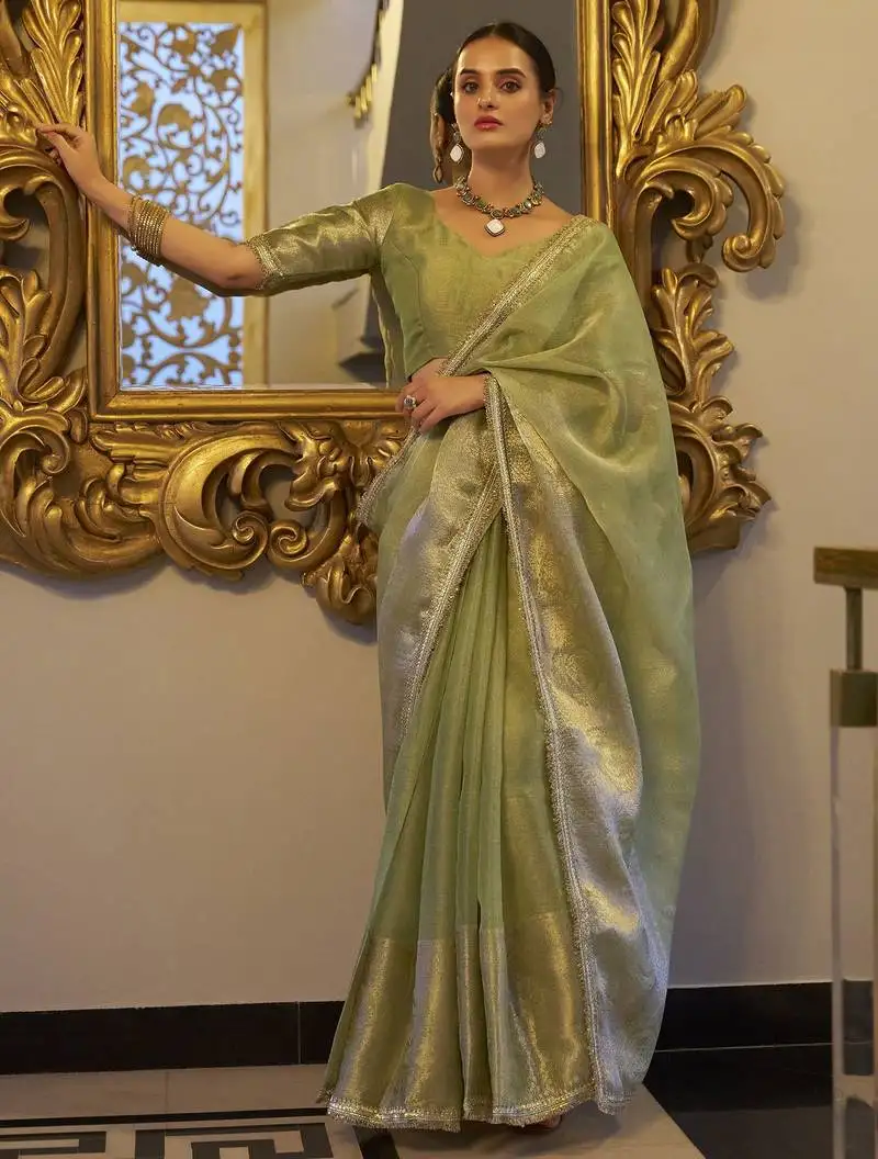 Pista green zari weaving tissue silk saree with blouse