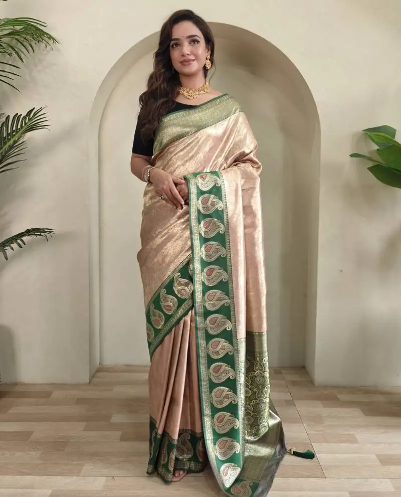 Cream self design embellished silk blend saree with blouse