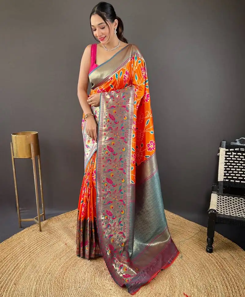 Orange self design embellished silk blend saree with blouse