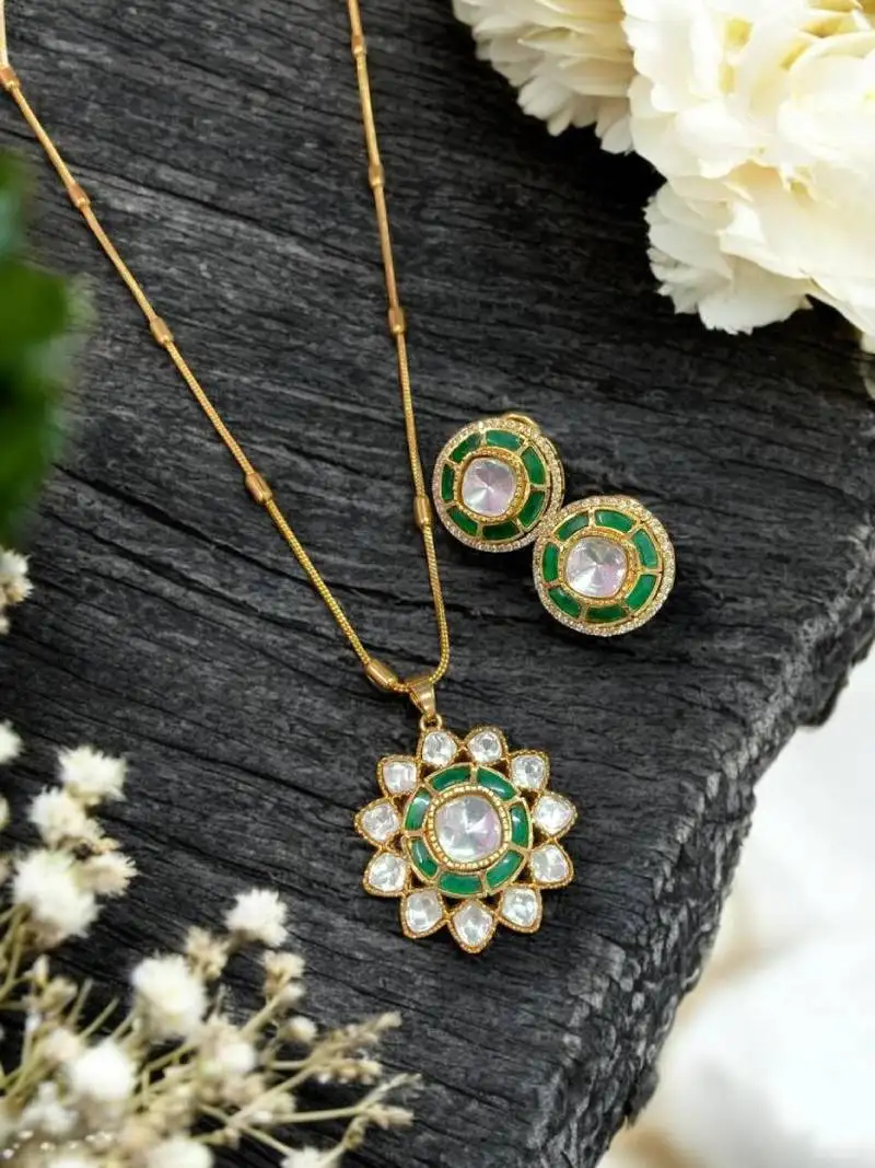 Elegant kundan green floral pendant set with earrings traditional gold finish jewelry by treemoda
