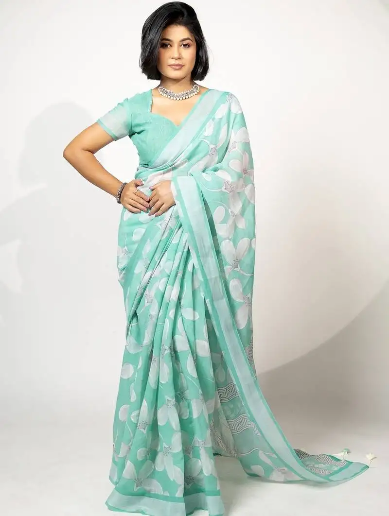 Women's teal floral print silver zari border cotton blend saree with unstiched blouse piece
