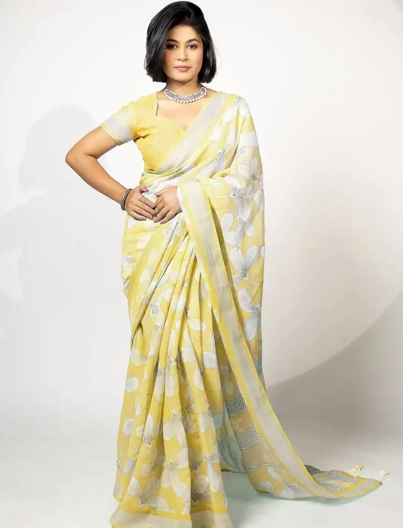 Women's pastel yellow floral print silver zari border cotton blend saree with unstiched blouse piece