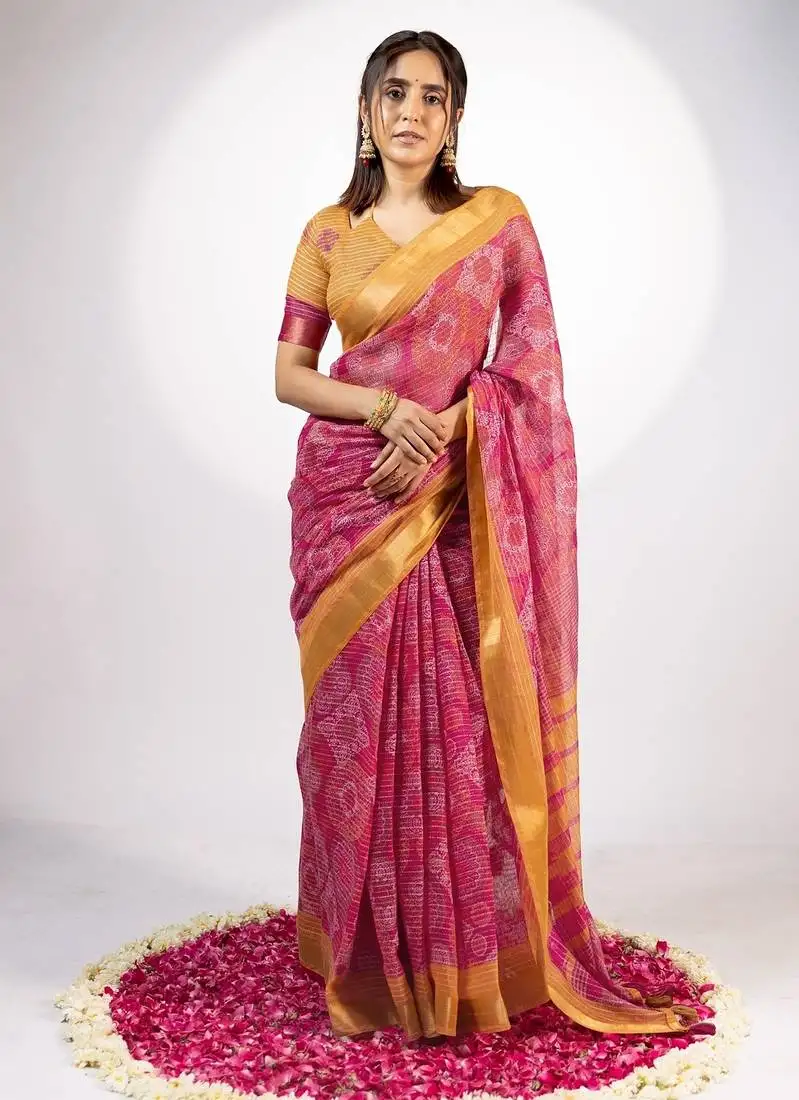Women's rani pink ajrakh print golden zari woven cotton blend saree with unstiched blouse piece