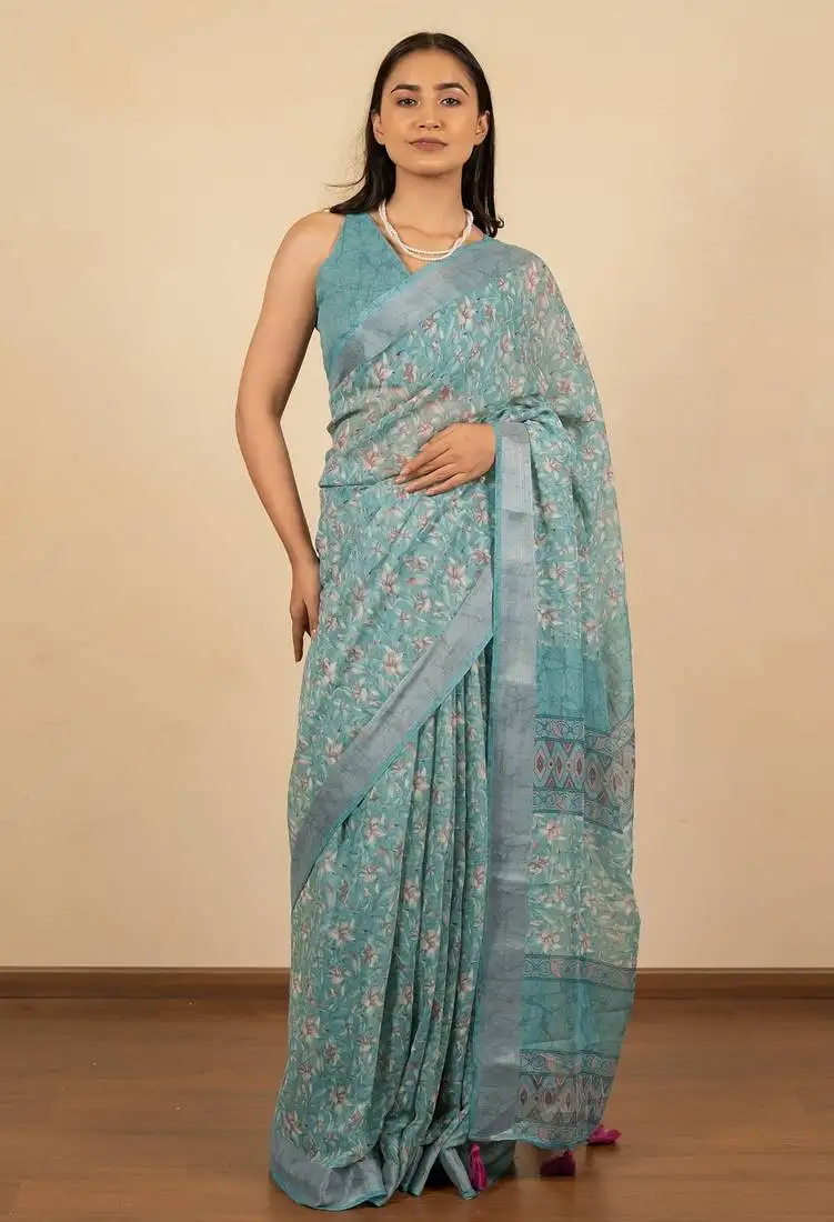Women's turquoise floral print silver zari border cotton blend saree with unstiched blouse piece