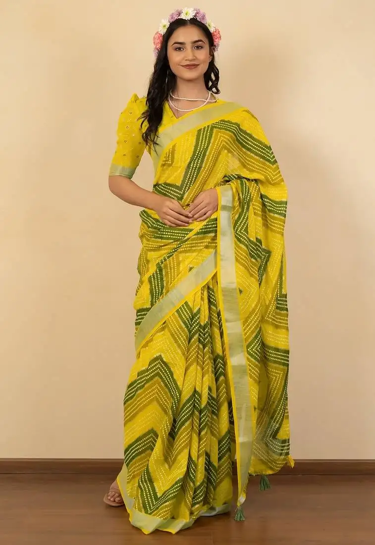 Women's yellow foil print silver zari border cotton blend saree with unstiched blouse piece