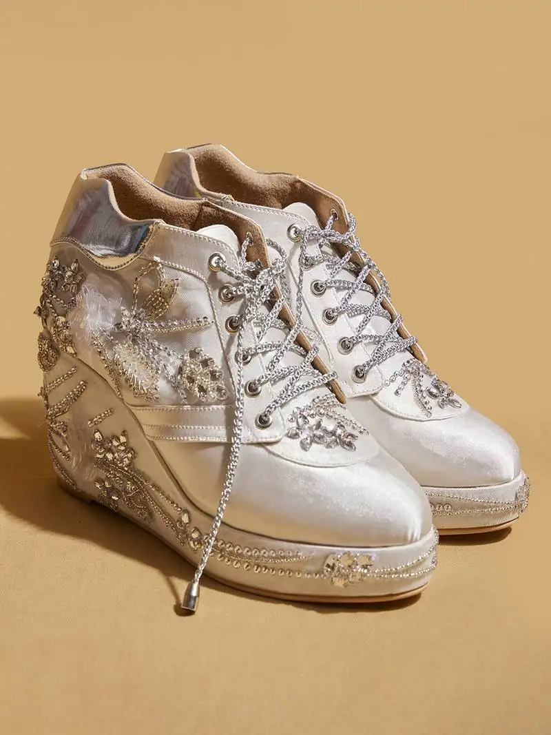 White embroidered satin heels