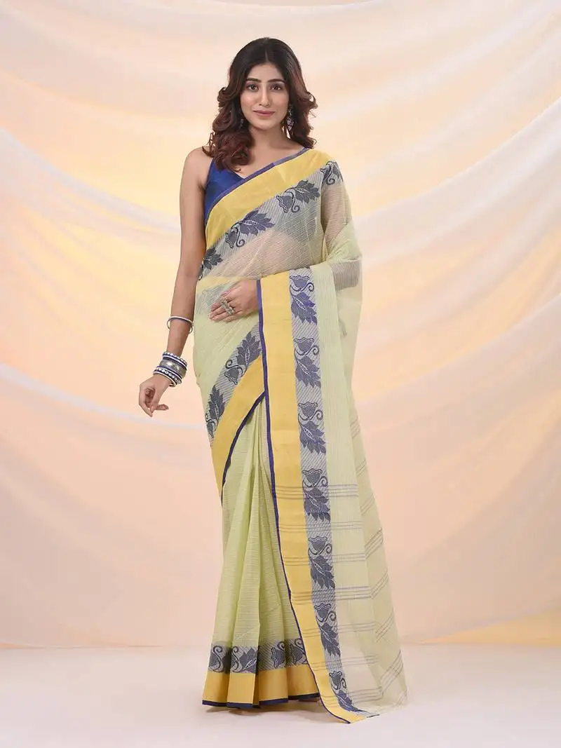 Lemon yellow pure cotton tant saree with woven designs