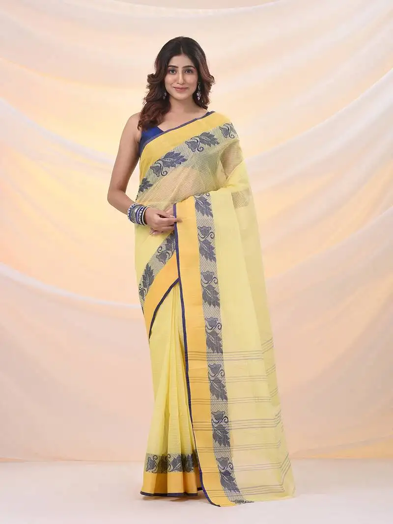 Yellow pure cotton tant saree with woven designs