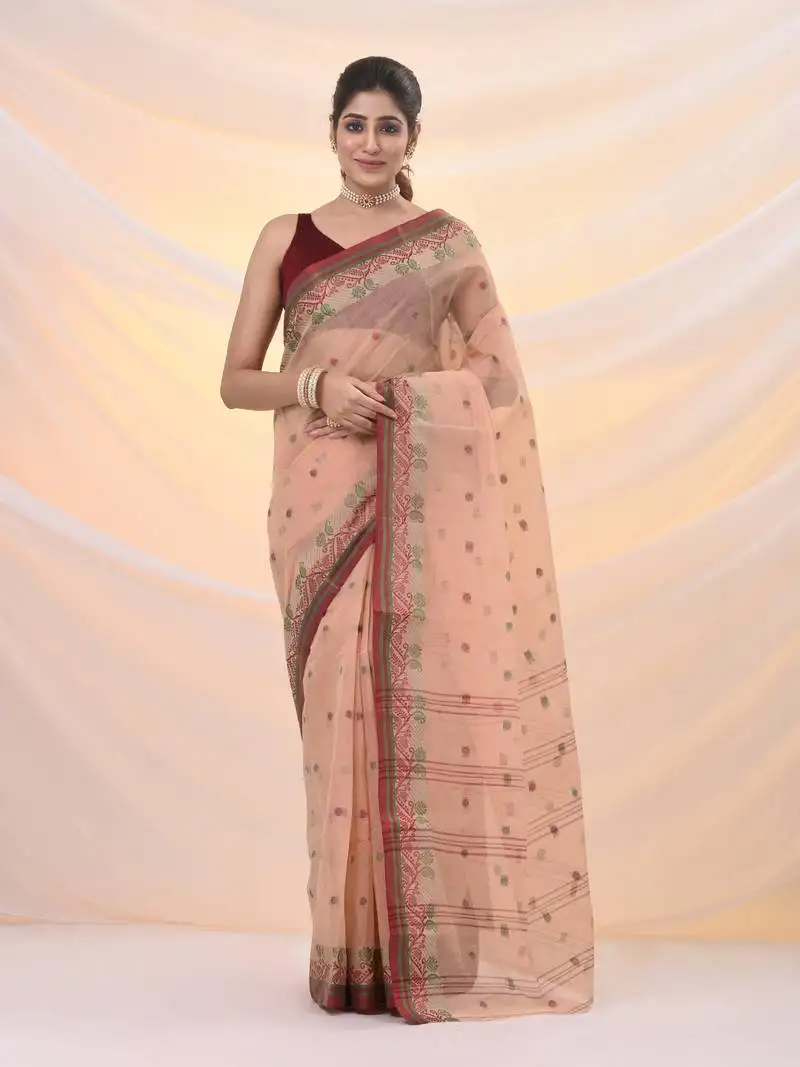 Beige pure cotton tant saree with woven designs