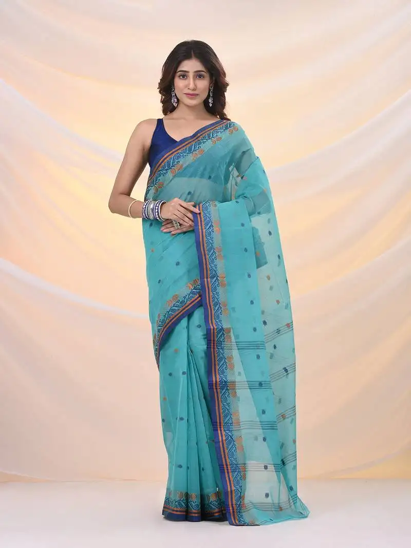 Sea green pure cotton tant saree with woven designs