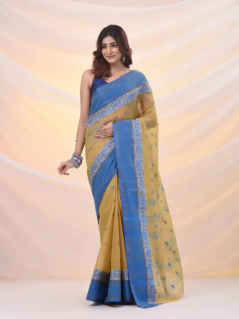 Light beige pure cotton tant saree with woven designs