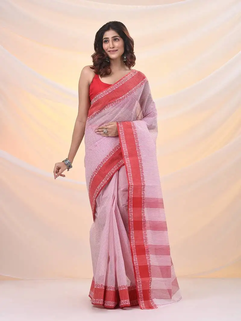 White pure cotton tant saree with woven designs