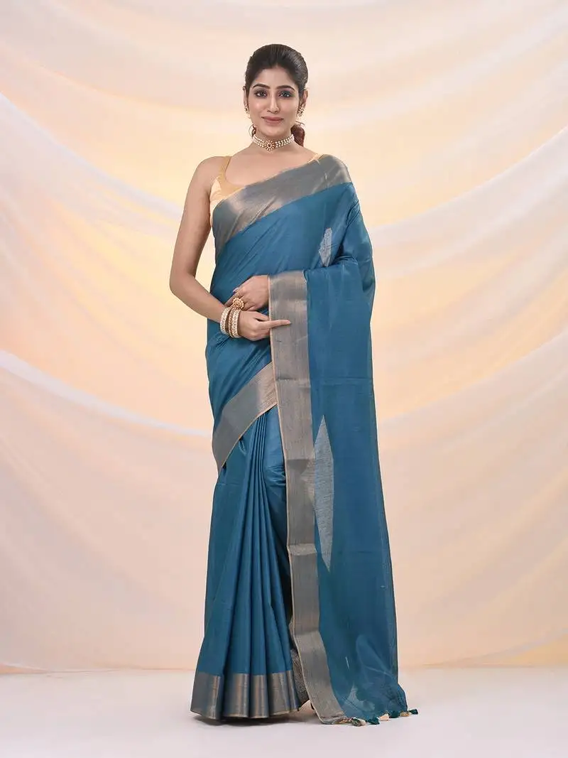 Teal silk blend soft saree with zari borders