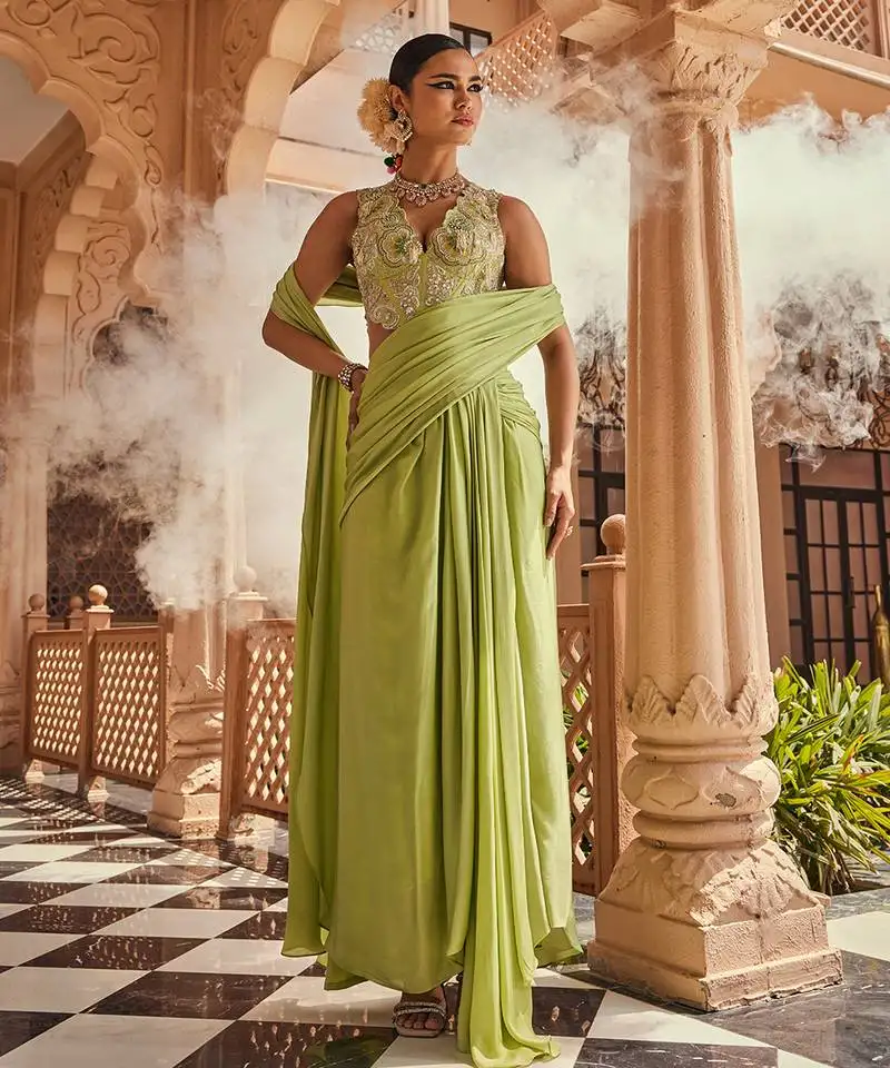 Green satin plain saree with embroidered blouse