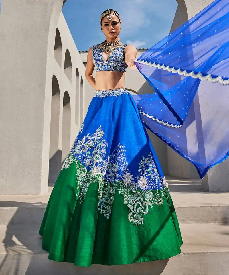 Green silk embroidered lehenga with blouse and dupatta