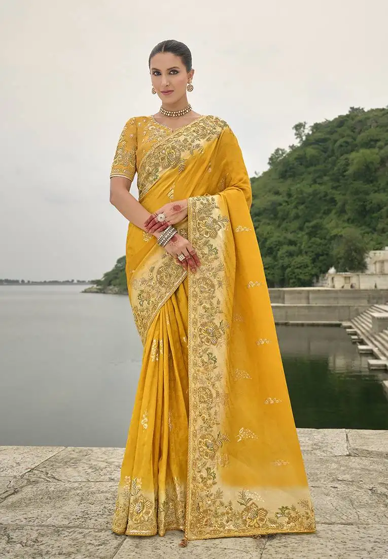 Yellow silk blend sequin embroidered patchwork border saree