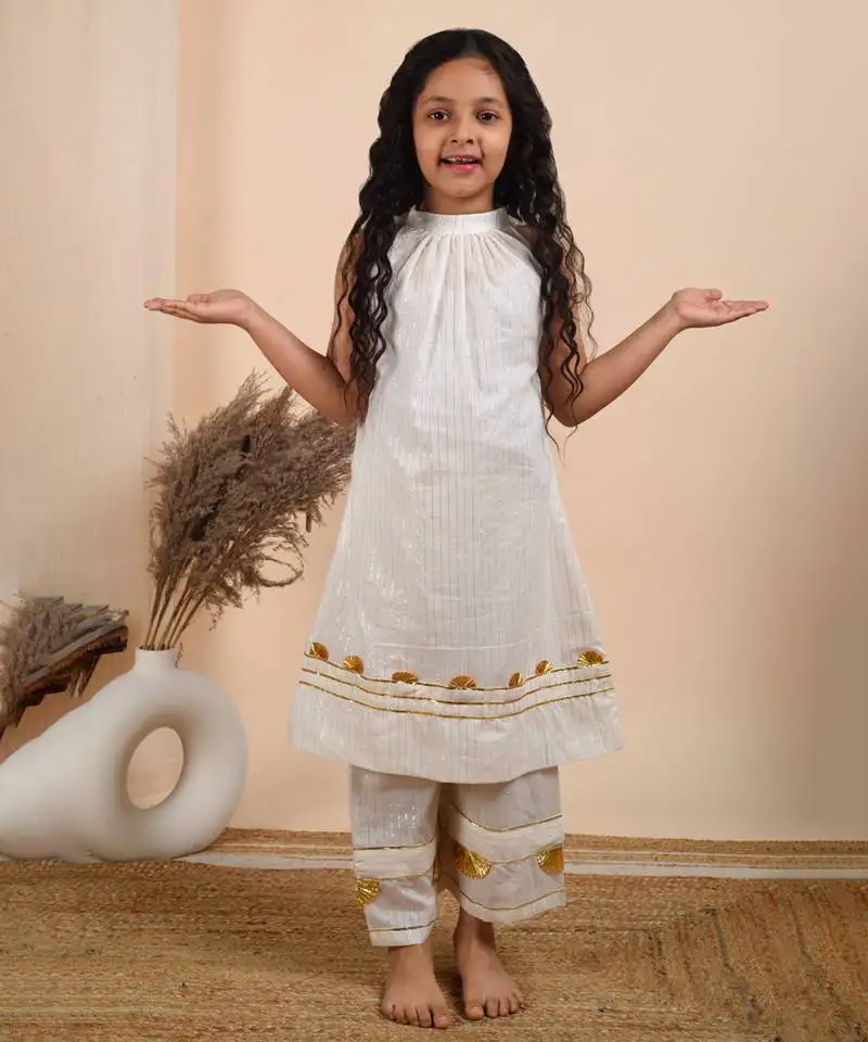 Ivory cotton woven kurta paired with palazzo