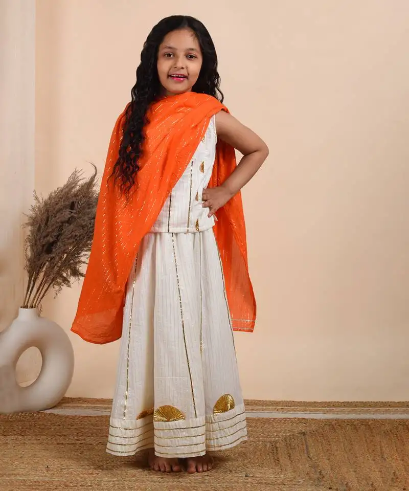 Ivory cotton woven top paired with skirt