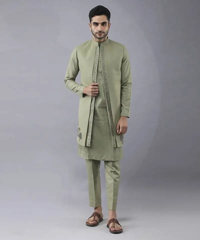 Olive green solid silk jacket paired with kurta & pant
