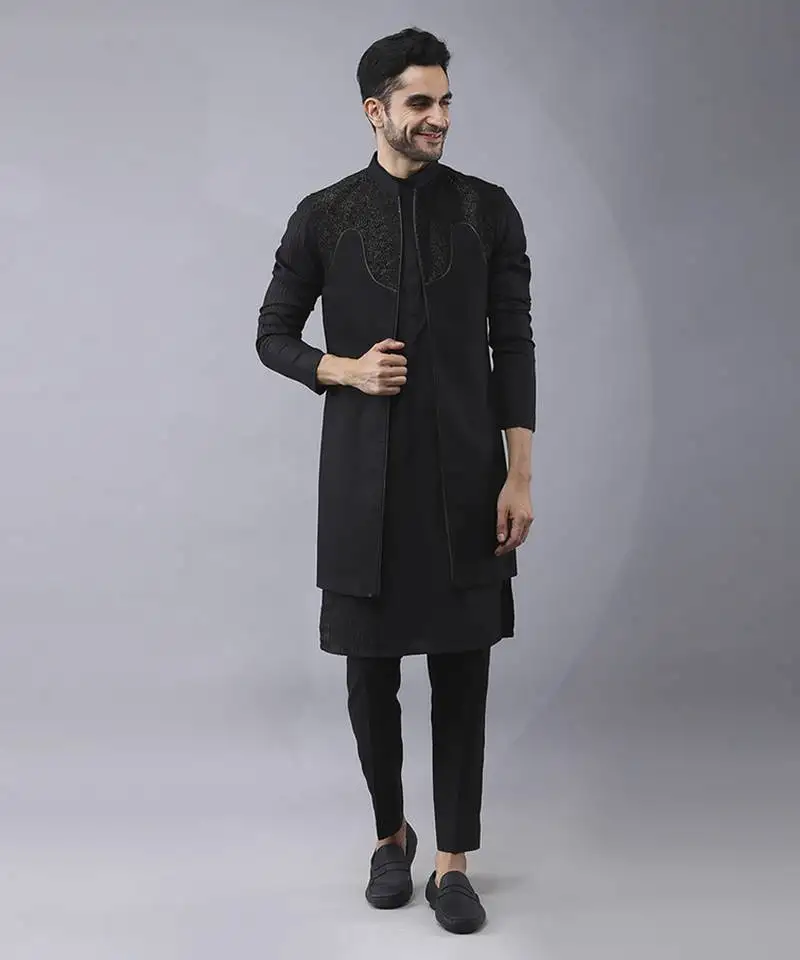 Black solid silk jacket paired with kurta & pant
