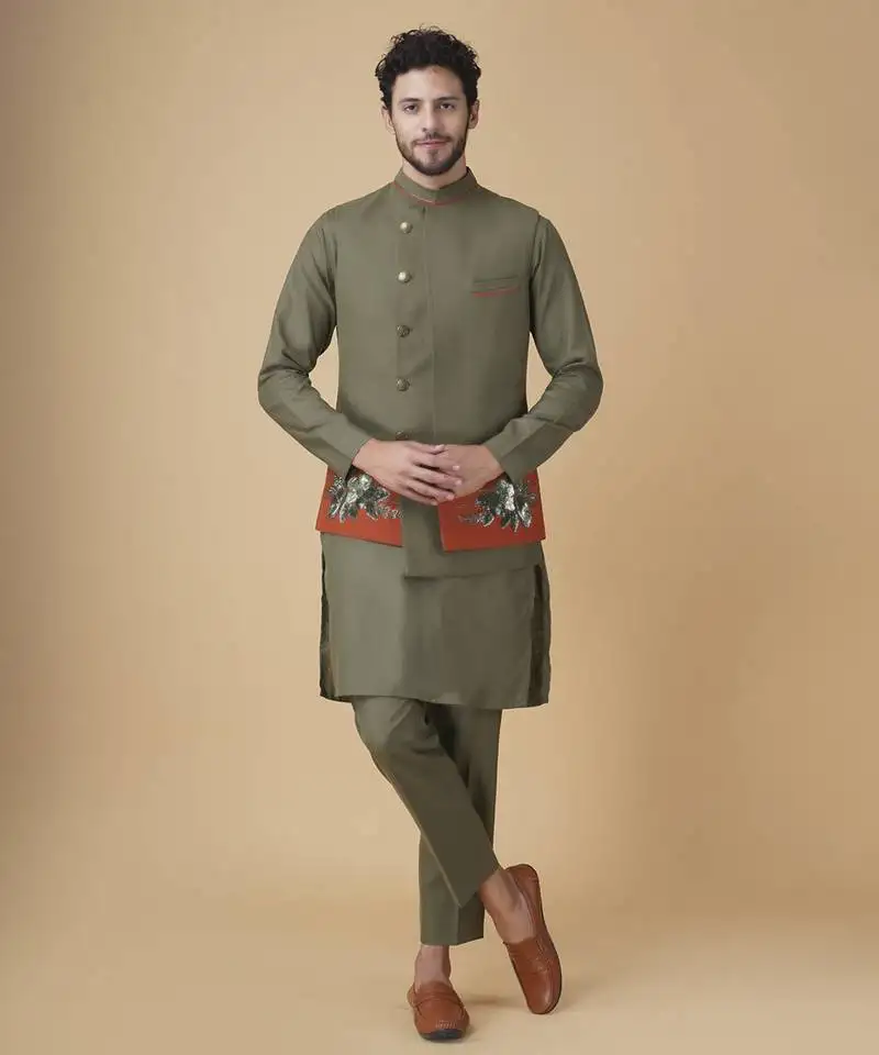 Emerald solid silk bandhgala jacket paired with kurta & pant