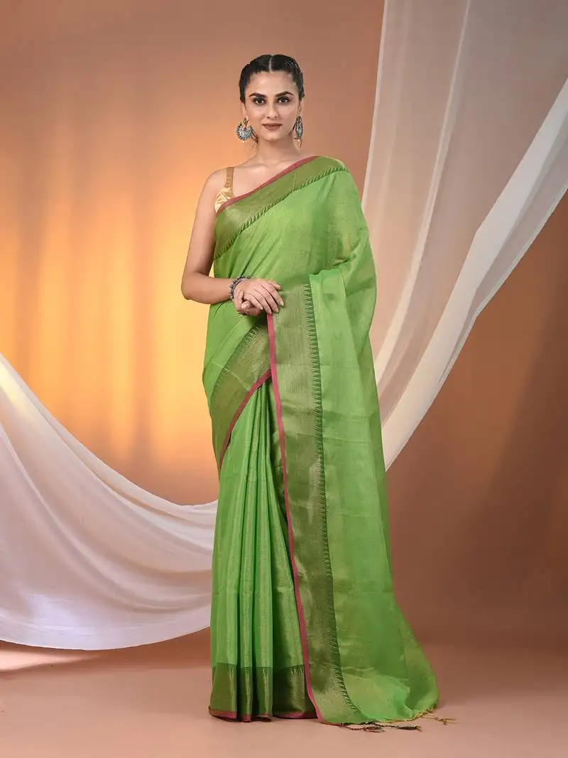 Green tissue soft saree with zari borders