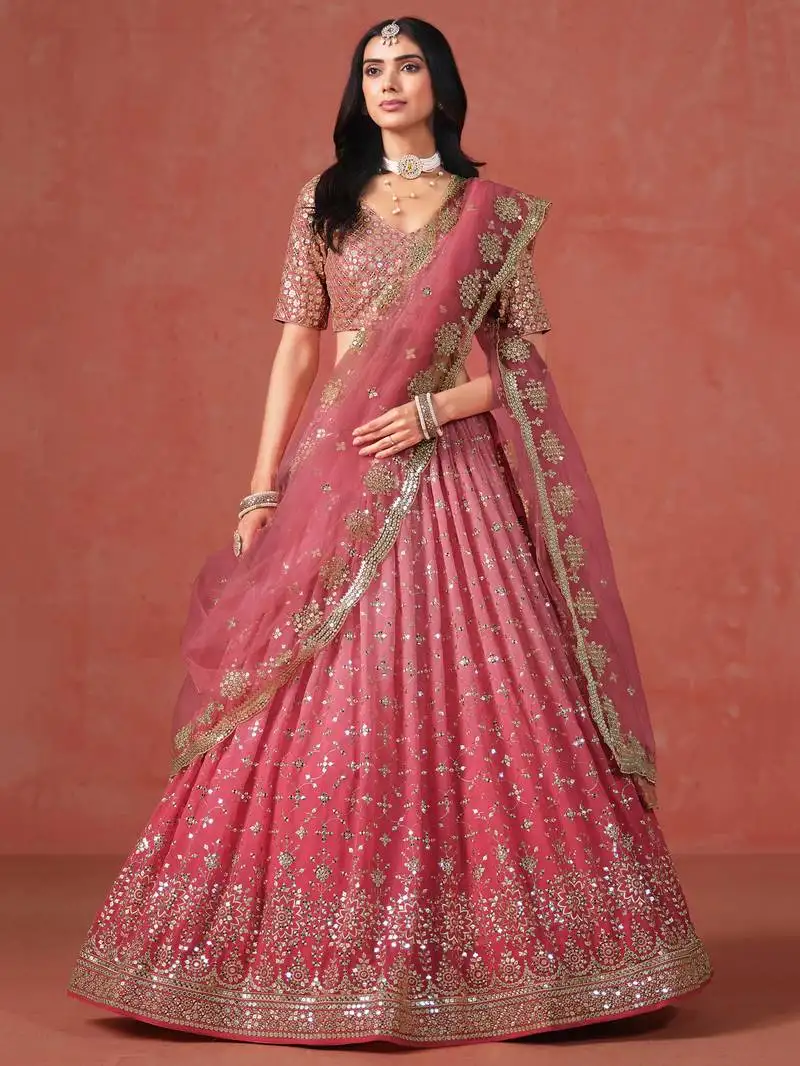 Fantastic peach and light-pink zari sequins embroidered georgette indian wedding lehenga dress