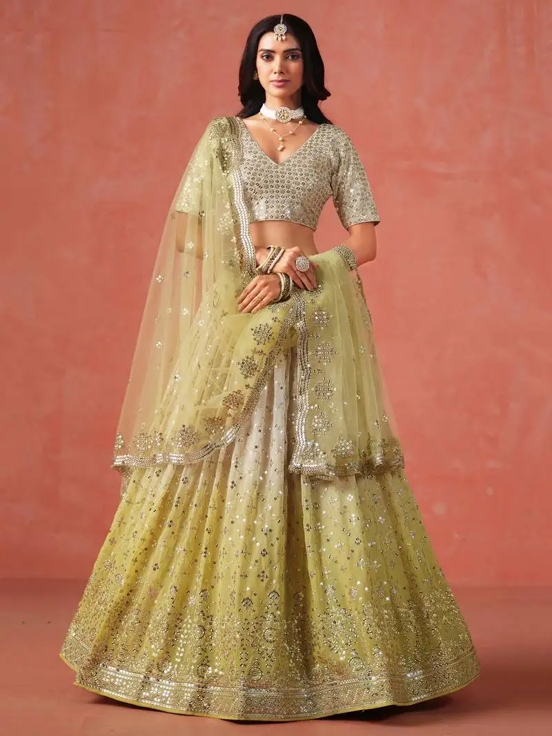 Beautiful gradient from soft yellow to beige zari sequins embroidered indian wedding lehenga