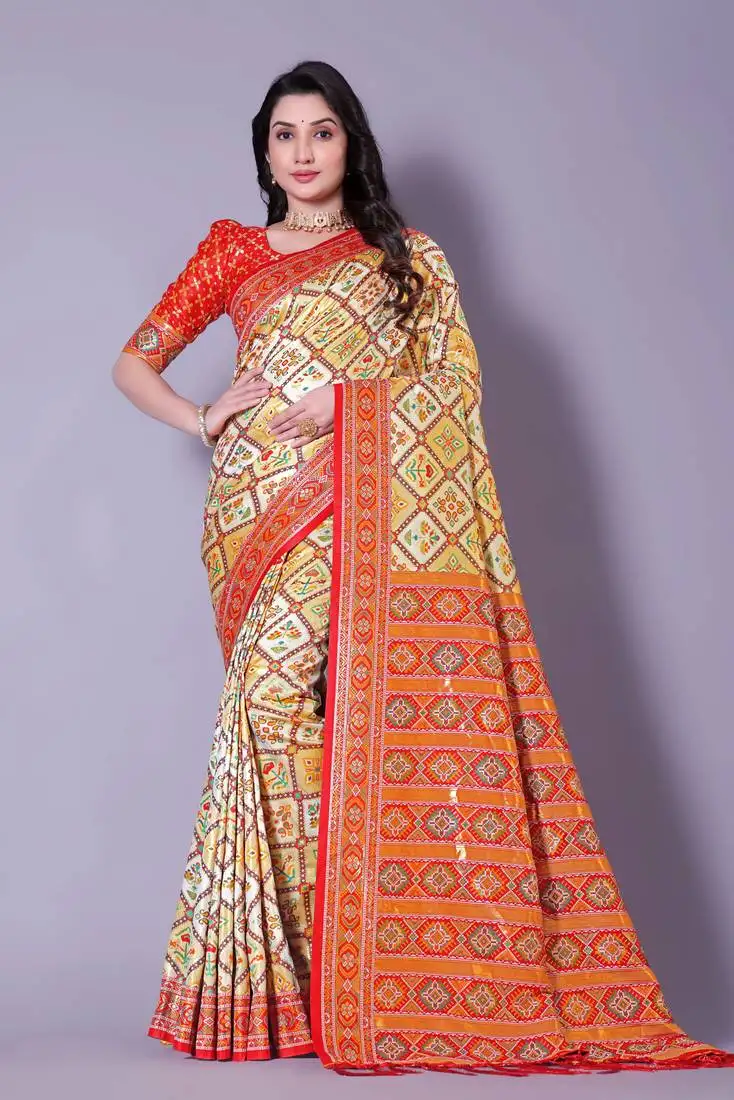 Multicolor patola cream saree with red border pallu
