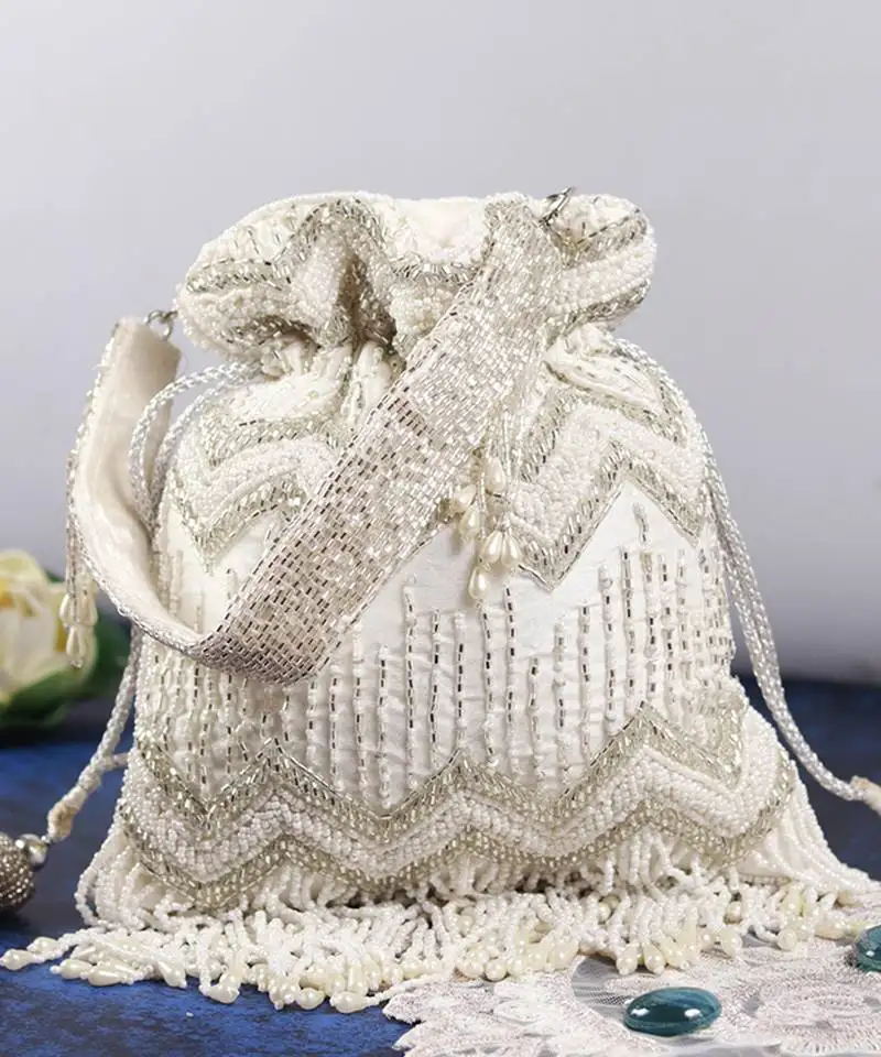 Suede white potli bag with detachable chain
