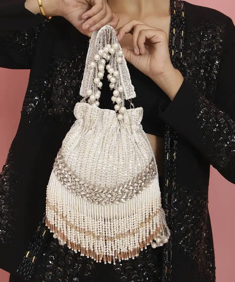 White suede potli bag with handle