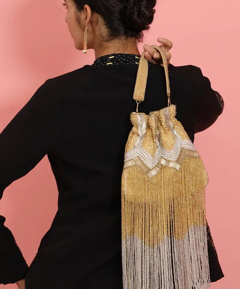Gold suede potli bag with handle