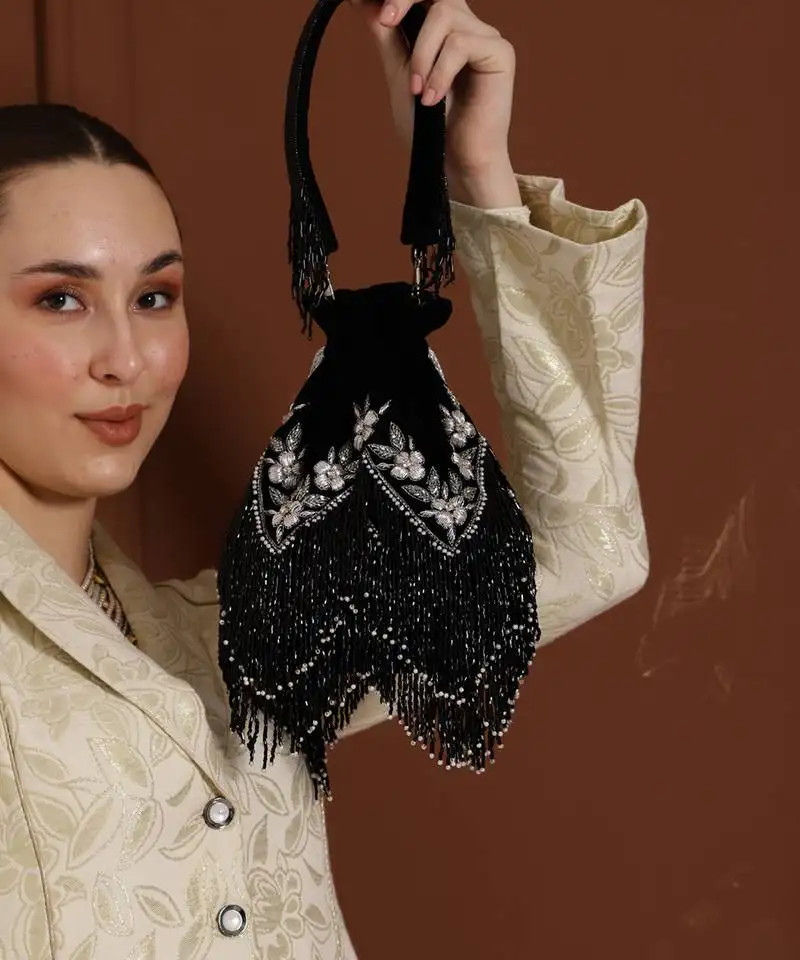 Black suede potli with handle