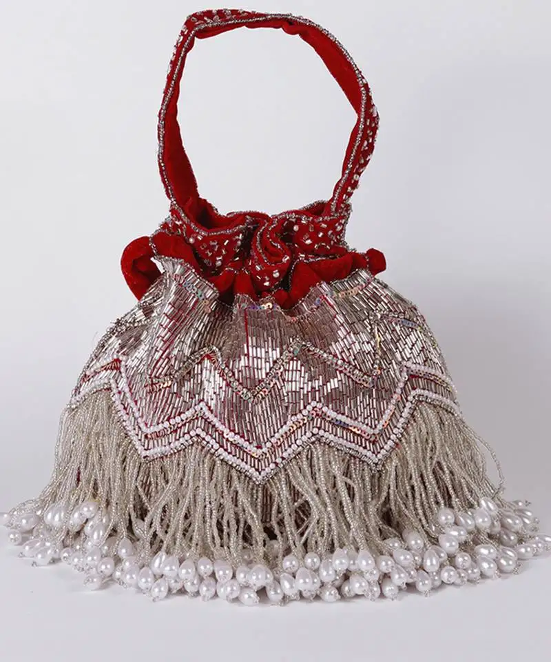 Red suede potli bag with handle