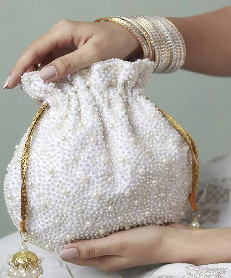 White silk potli bag with handle