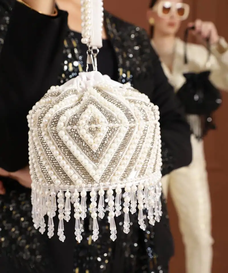 White suede embroidered mini potli with glass bead hangings