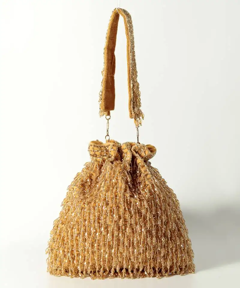 Gold suede golden potli bag with handle