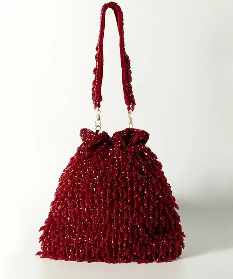 Red suede red potli bag with handle