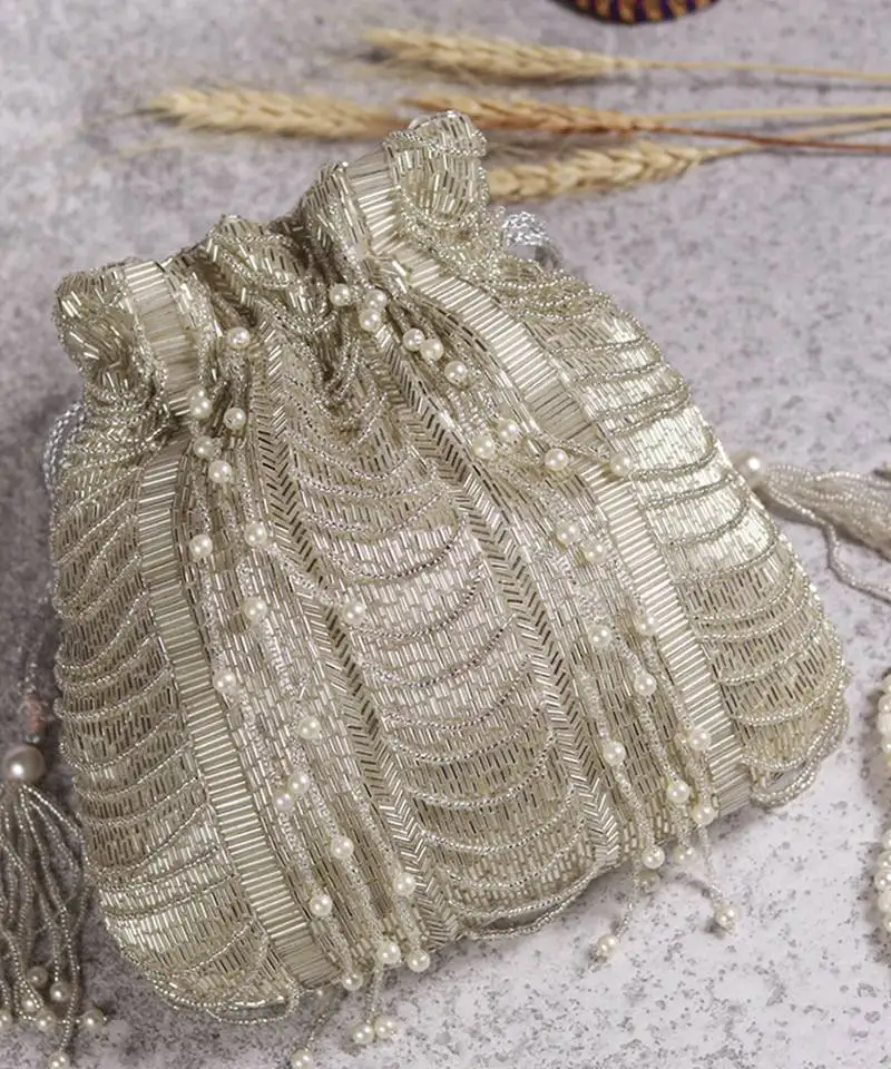 Silver suede potli bag with handle