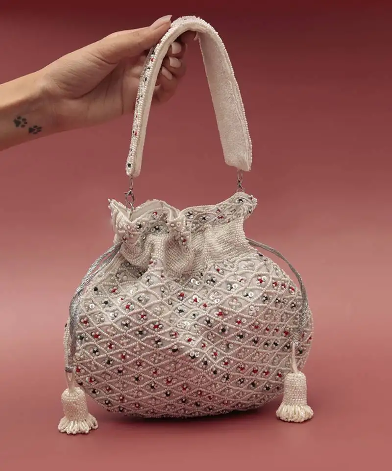 Suede white potli bag with handle