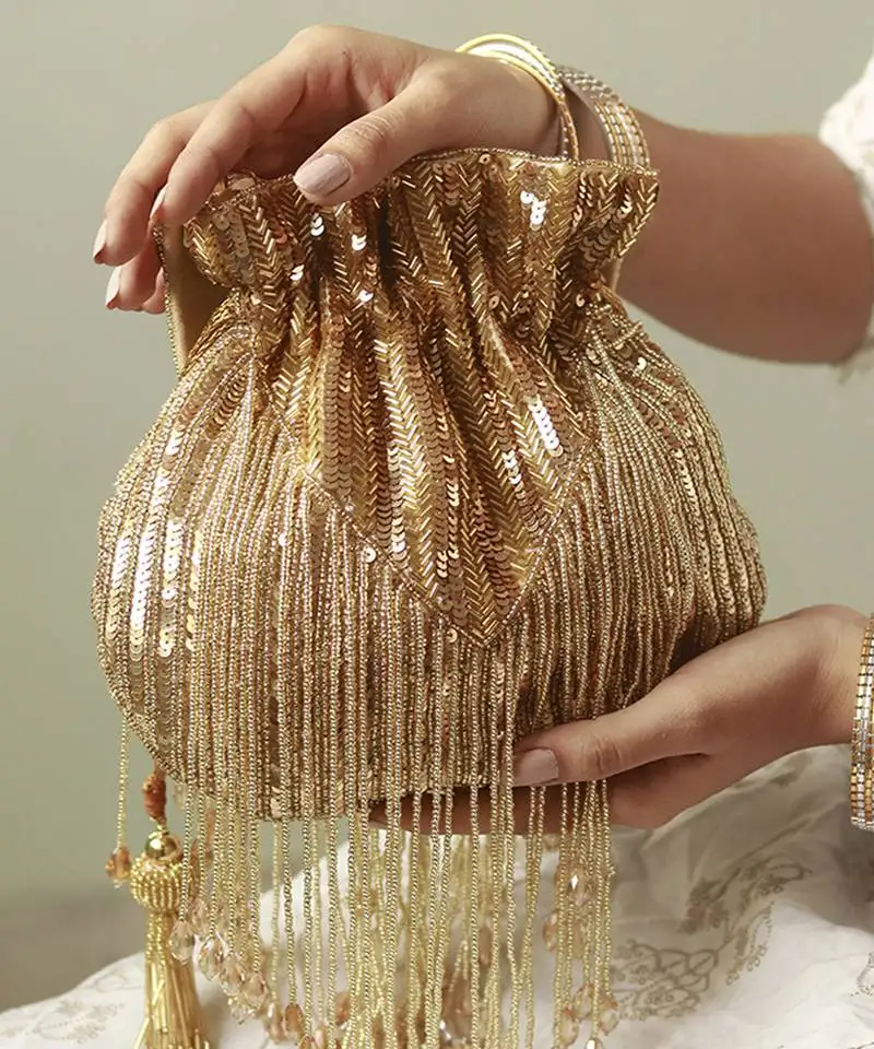 Gold silk tassles potli with handle